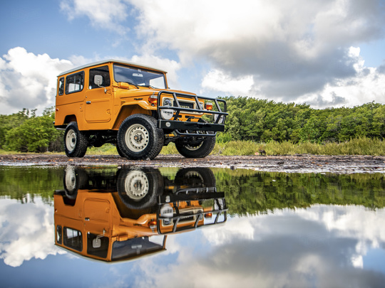 The FJ Company - 1984 FJ43 113296 Pollux Orange - Outdoors