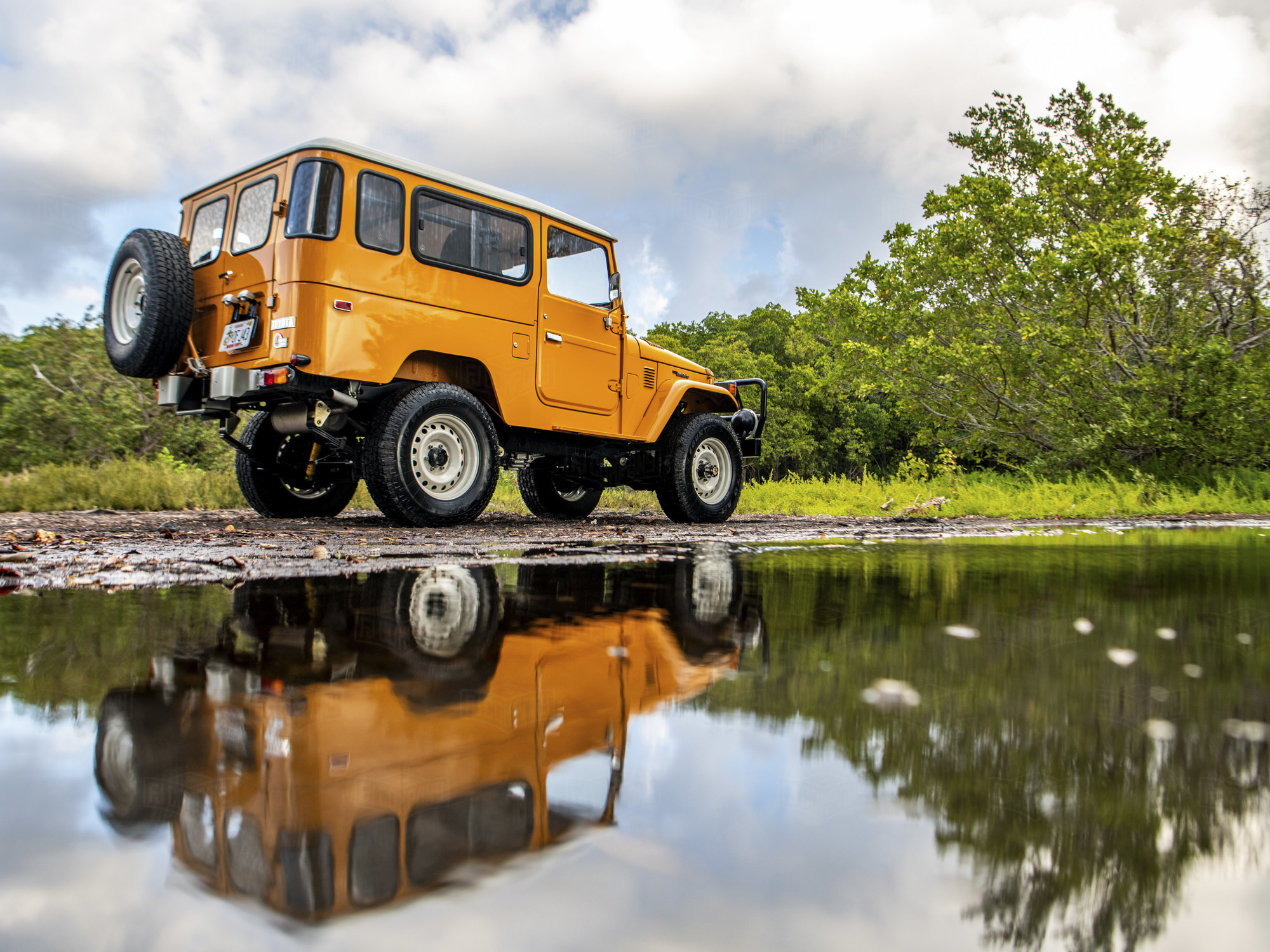 The FJ Company - 1984 FJ43 113296 Pollux Orange - Outdoors